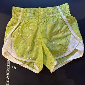 green short with silver